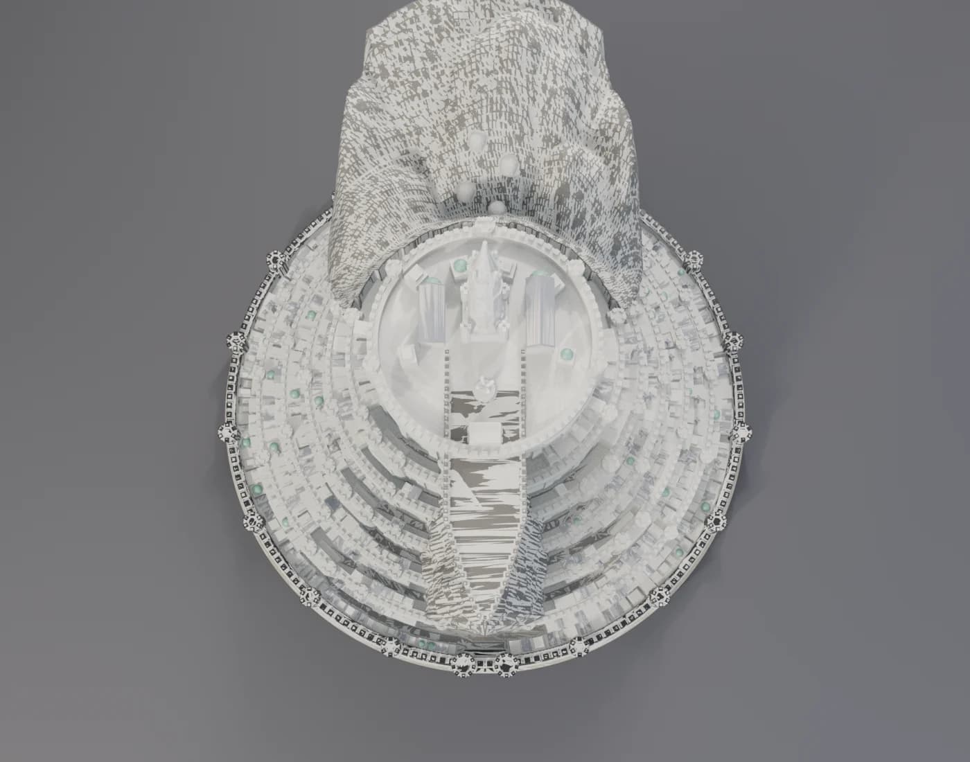 Overhead view of the Minas Tirith model showing the walls stepping around the mountain and central rock spur.