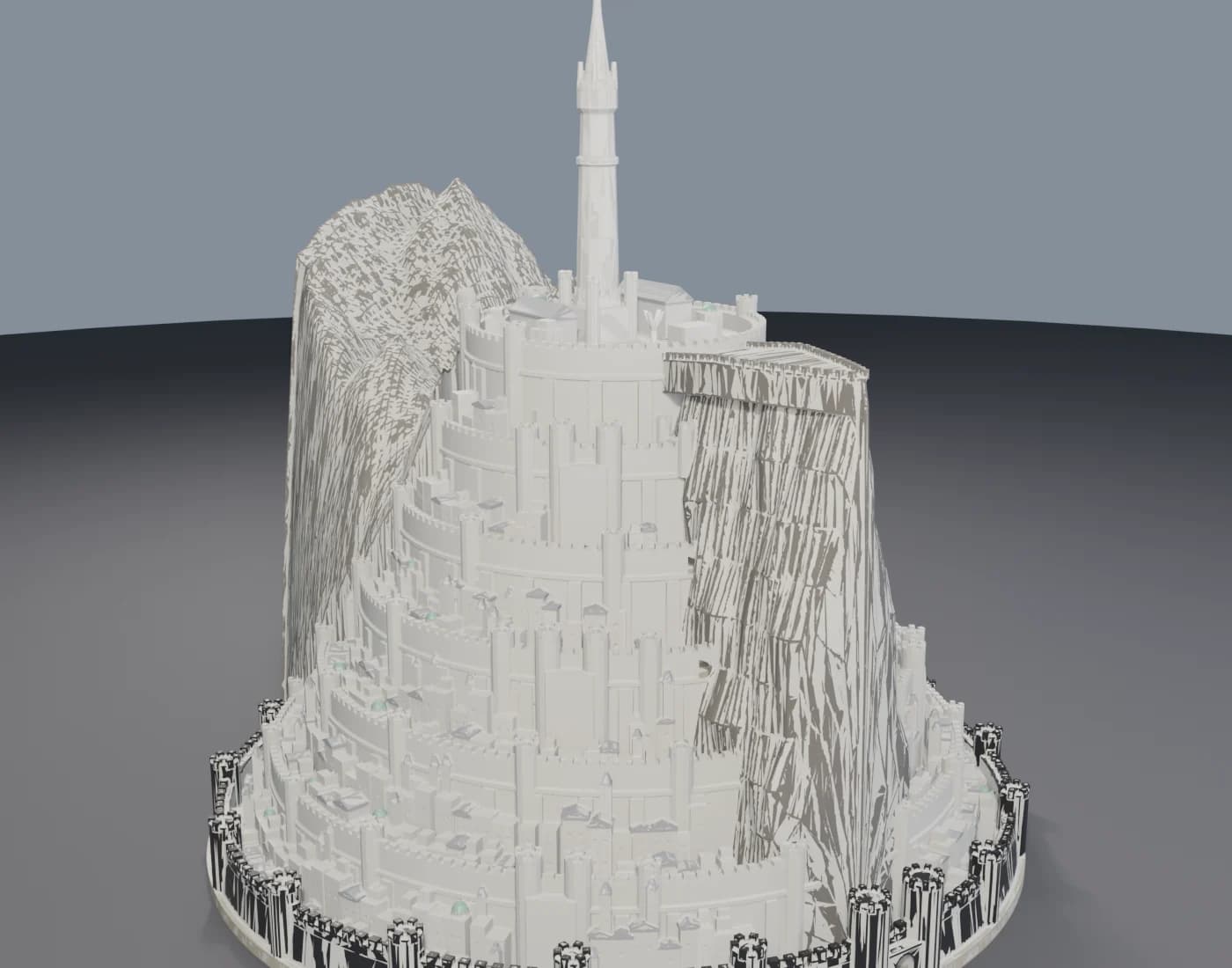 Blender view of a tiered Minas Tirith model with a projecting rock spur and citadel above the city.