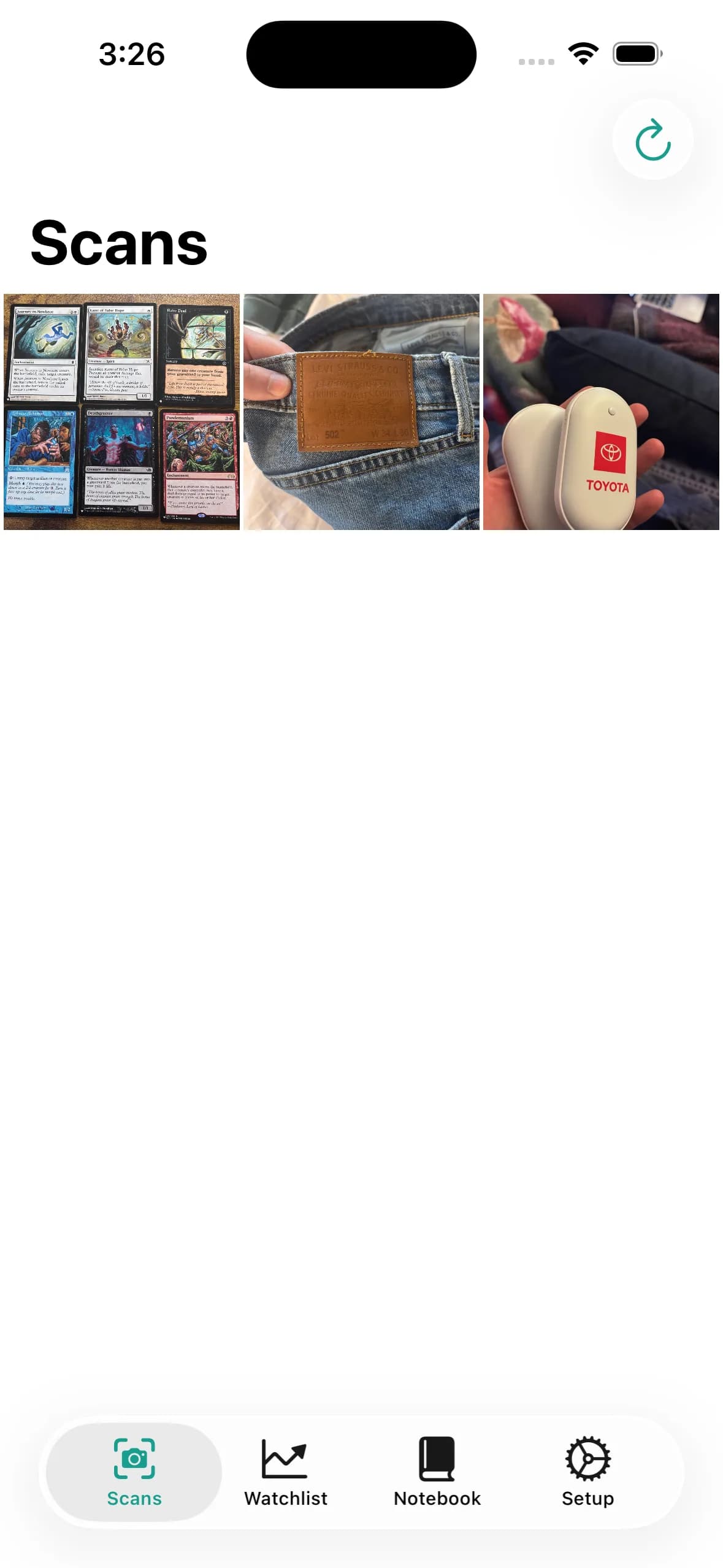 The Scans tab, a three-column gallery of captured products, each a tap away from analysis.